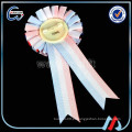 Emblema redondo da rosette da fita